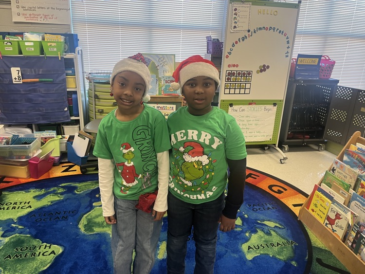 Students dressed in green for Grinch Day.