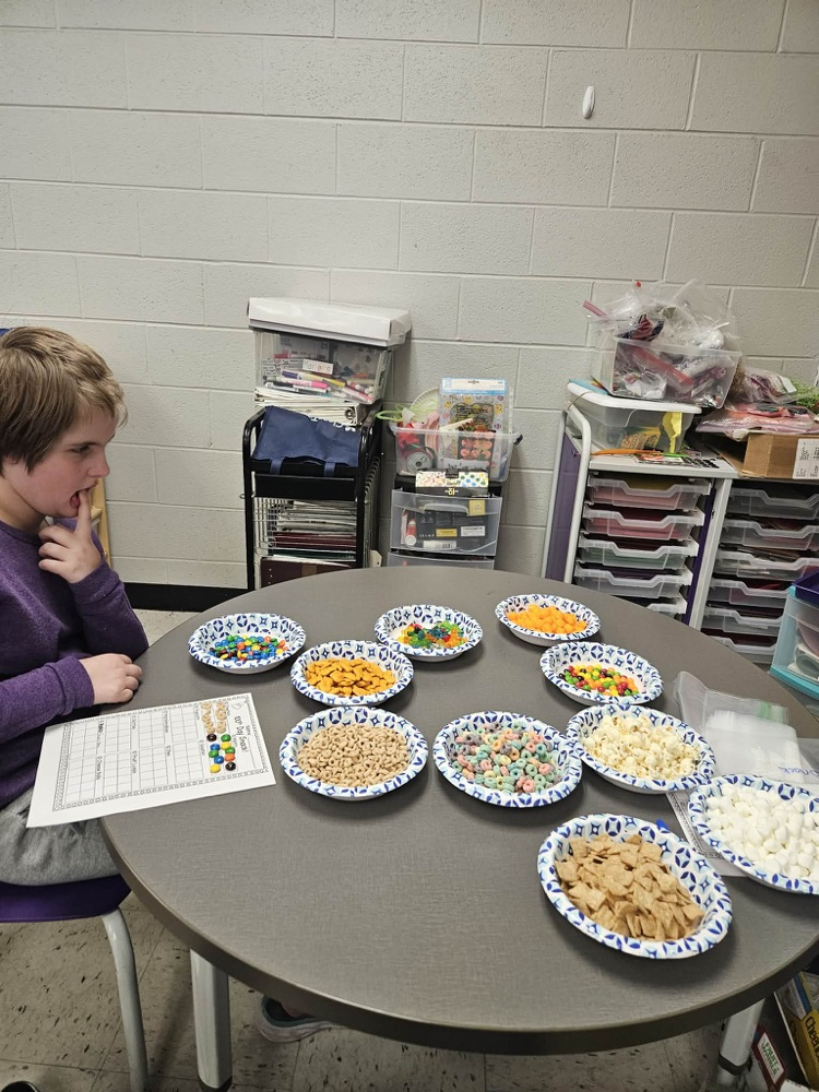 Students sorting items for the 100th day!