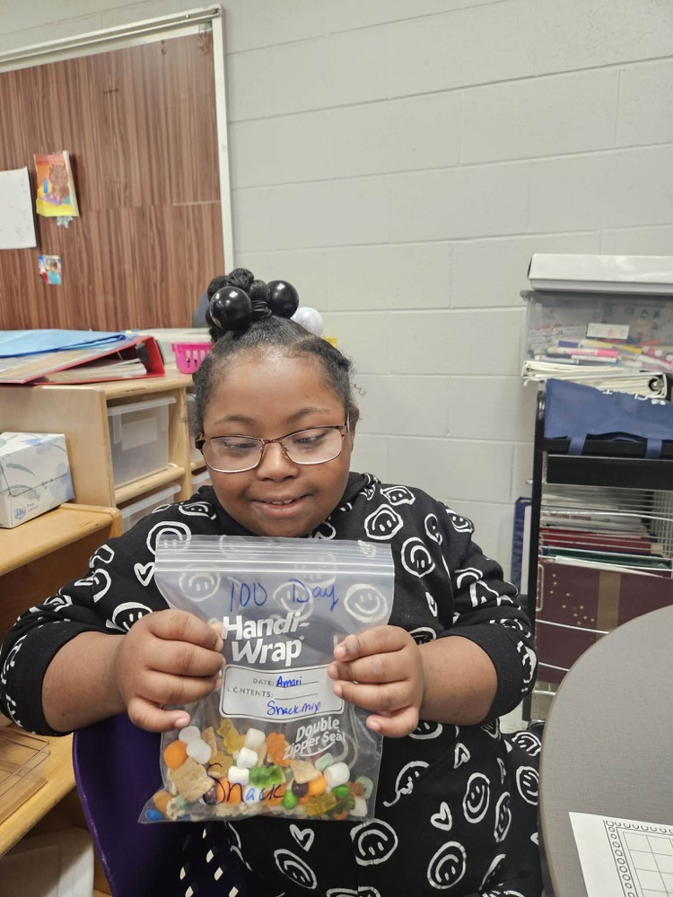 Students sorting items for the 100th day!