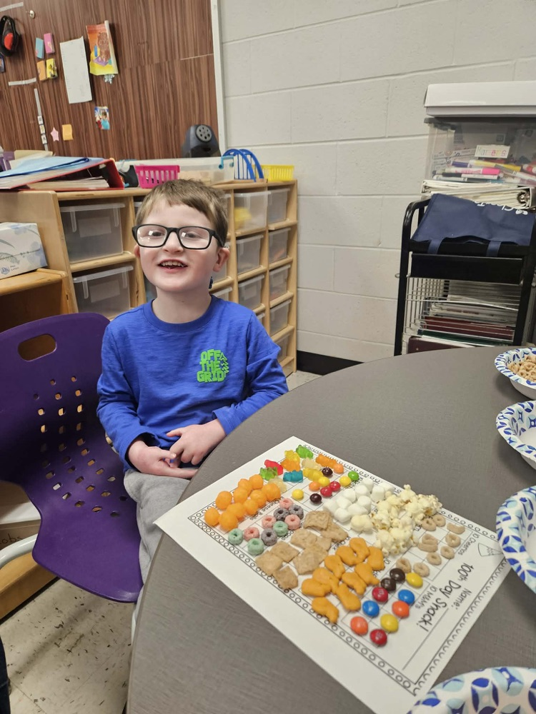 Students sorting items for the 100th day!