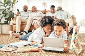 tablet, children on carpet