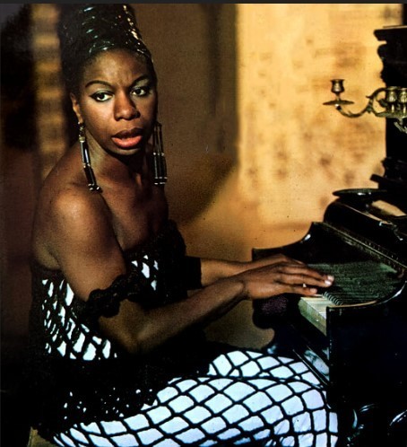 Nina Simone playing the piano