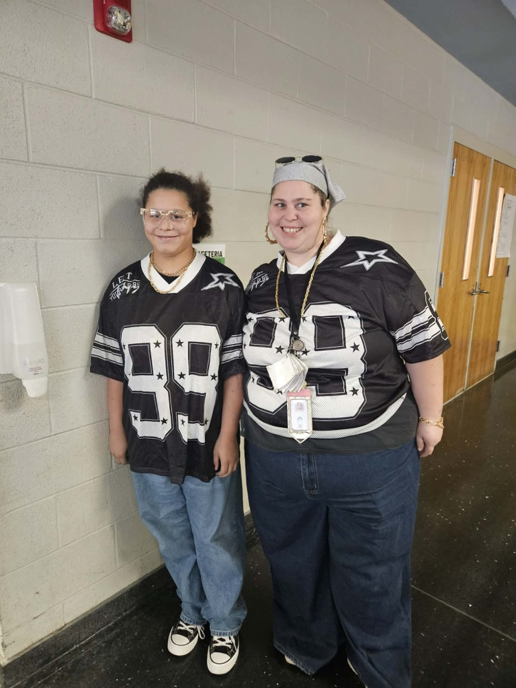 The photos show students and staff dressed for spirit week