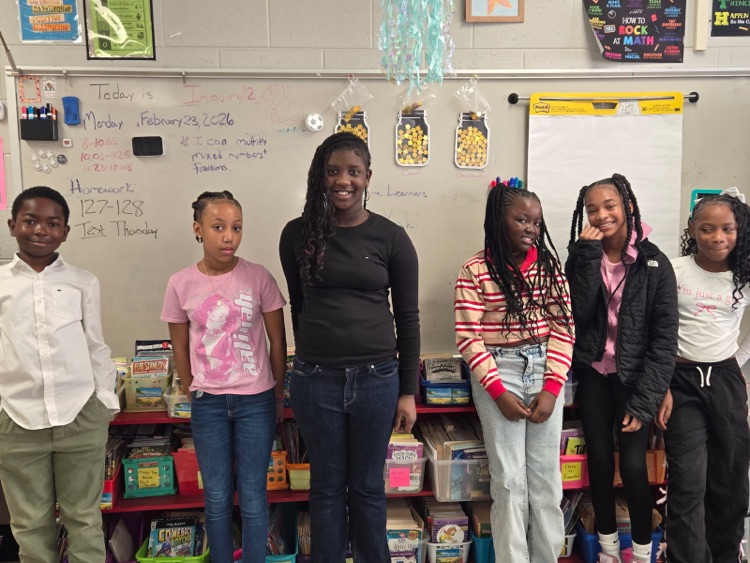 The photos show students and staff dressed for spirit week