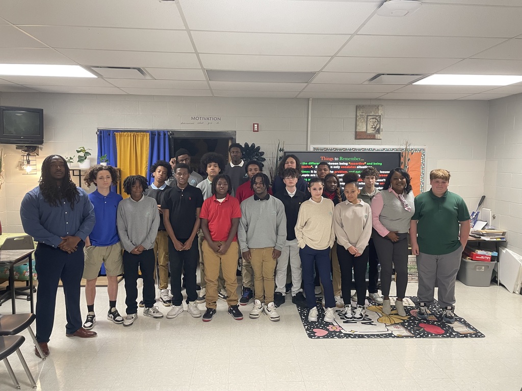 Group picture of Joey Brown with our TLC students and Mrs. Wilson-Young