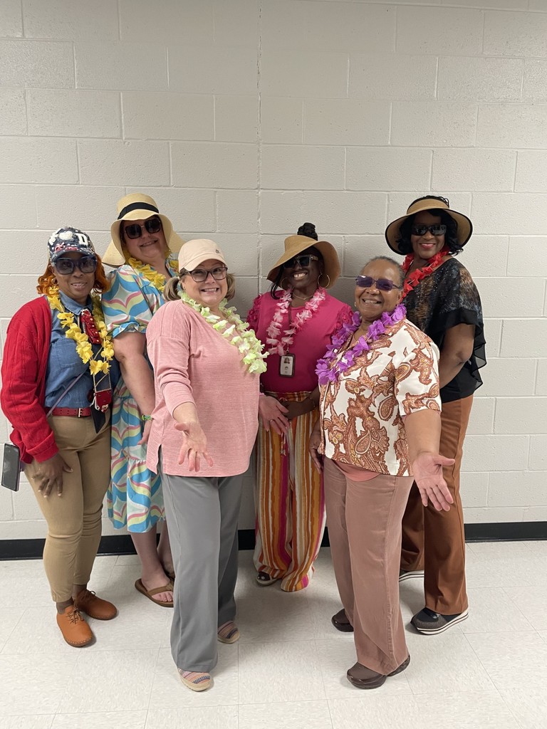 TLC staff with their sun hats and shades!