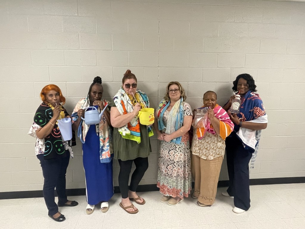 TLC staff with their "anything but a cup."