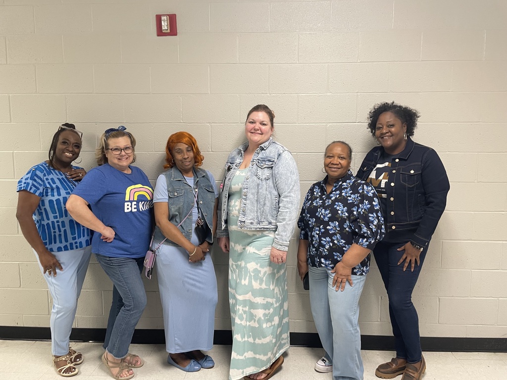 TLC staff in shades of blue.