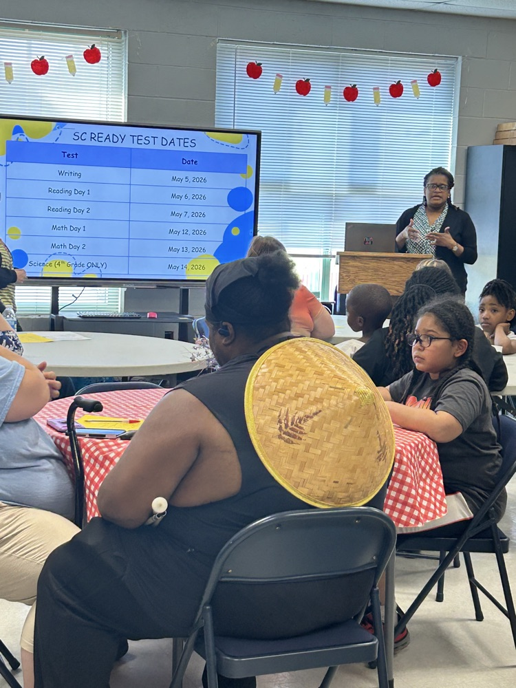 The photos show families in grades 3-5 at our family workshop. 