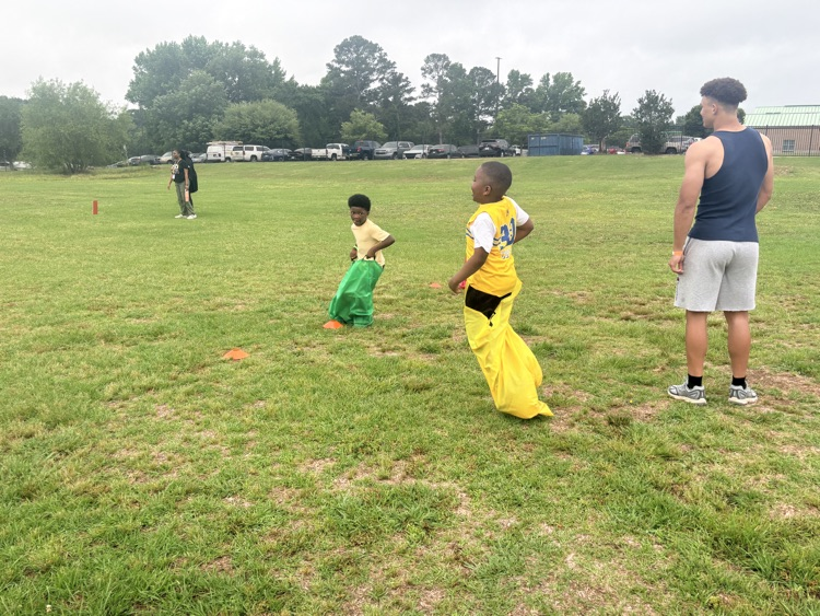 Students are playing at Field Day. 