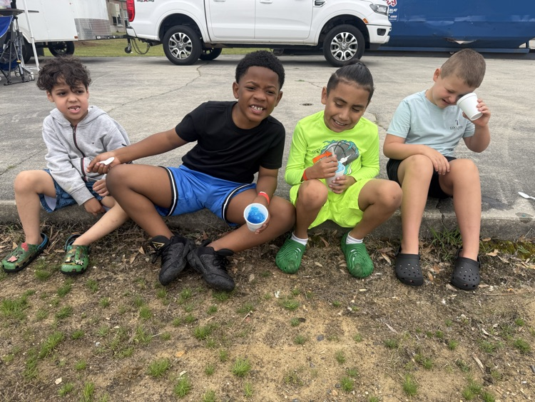 Students are playing at Field Day. 