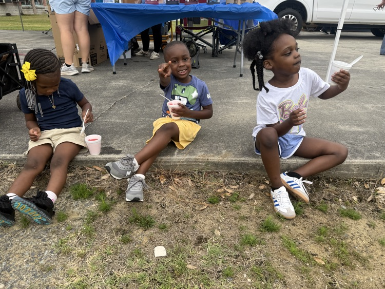 Students are playing at Field Day. 