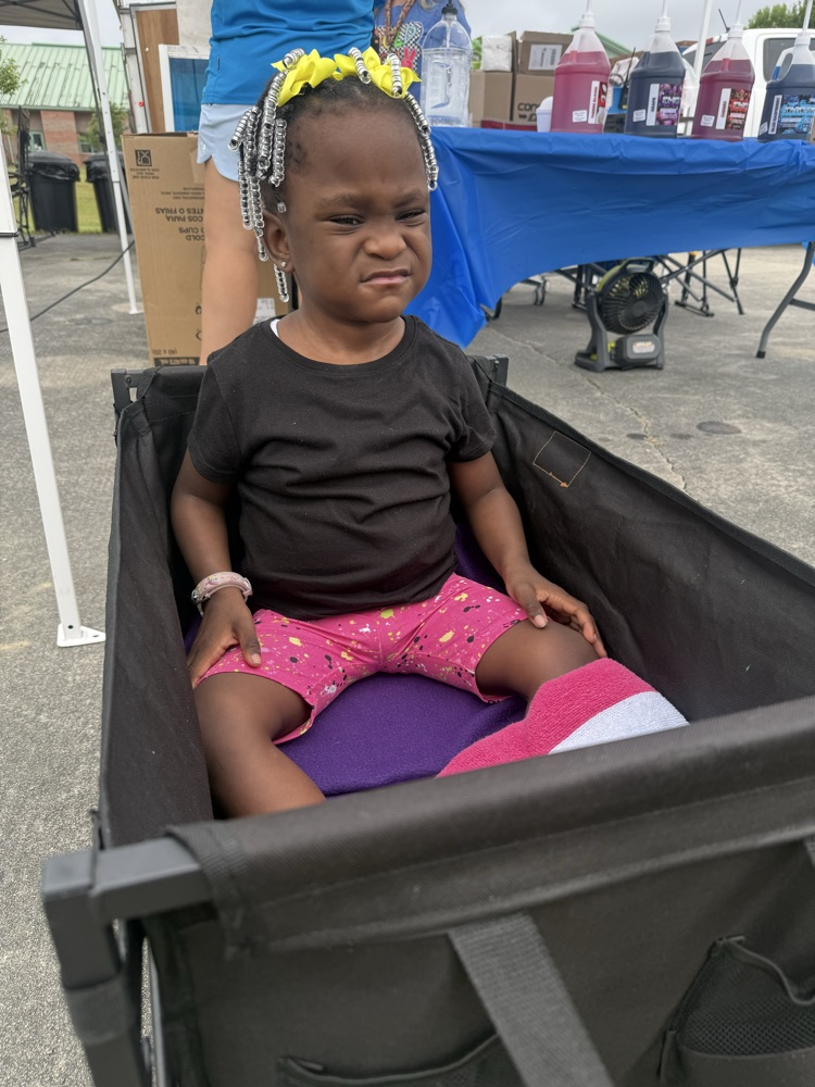 Students are playing at Field Day. 