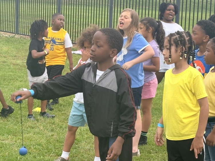 Students are playing at Field Day. 