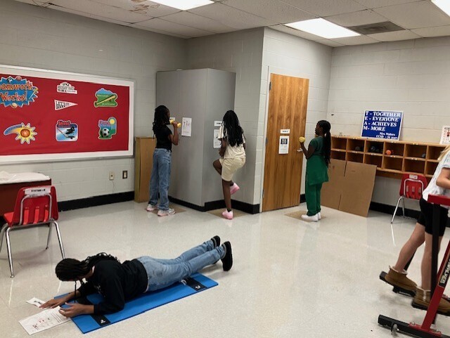 Students are working out in the Fitness Lab.