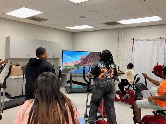 Students are working out in the Fitness Lab.