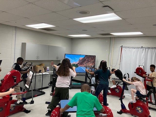 Students are working out in the Fitness Lab.