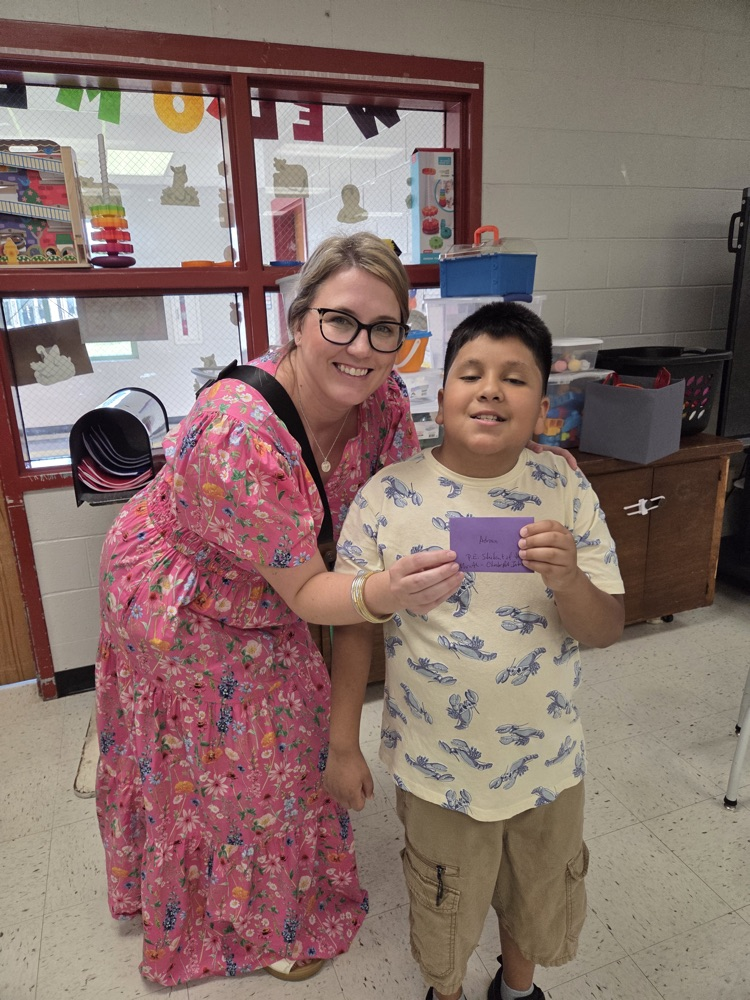 Mrs. Stripling presented Adrian his Chicken Coop award  