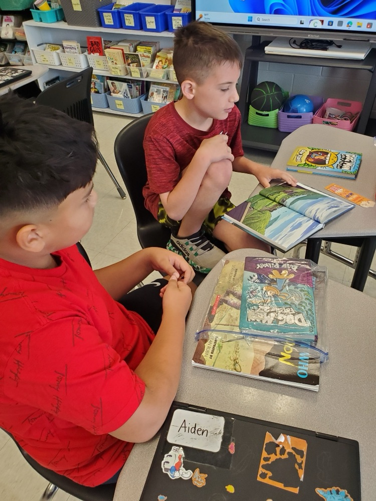 Students are partner reading. 