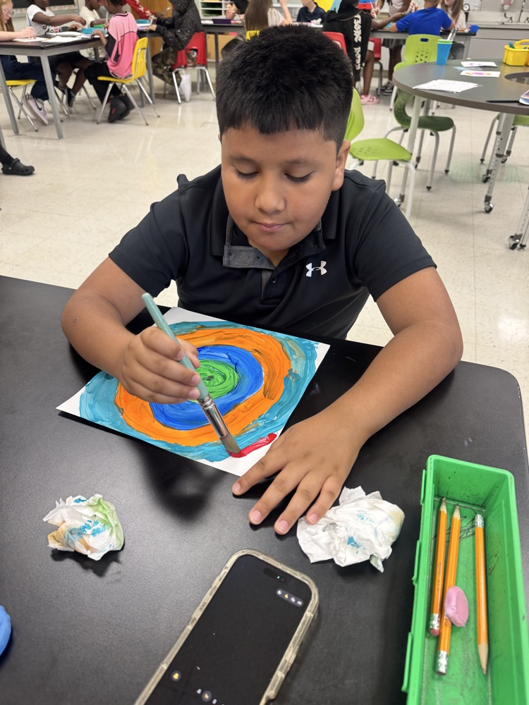 Students enjoying art. 