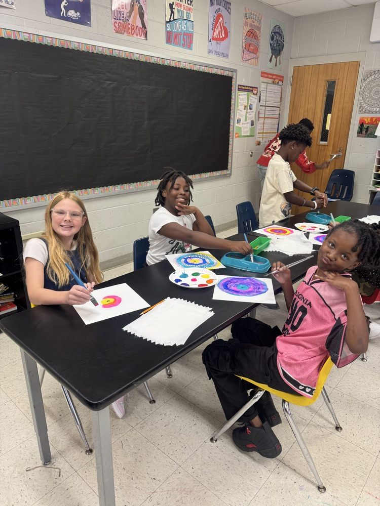 Students enjoying art. 