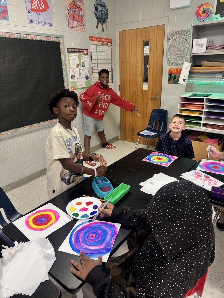 Students enjoying art. 