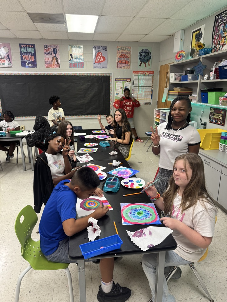 Students enjoying art. 
