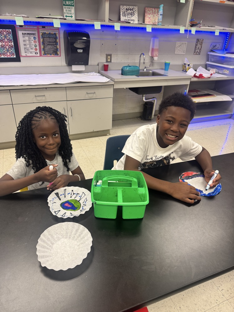Students enjoying art. 