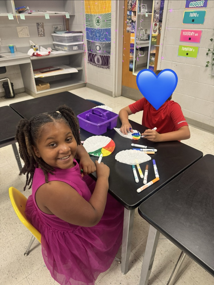 Students enjoying art. 