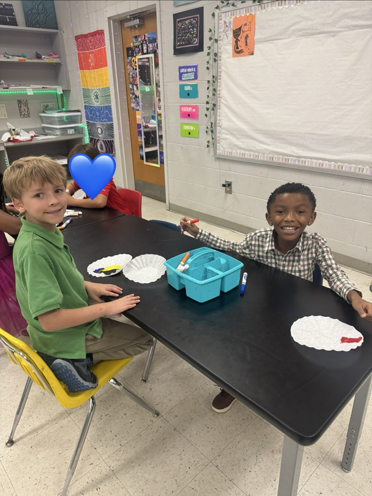 Students enjoying art. 
