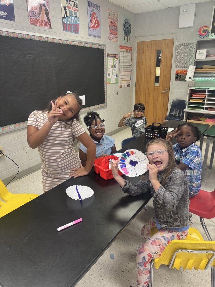 Students enjoying art. 
