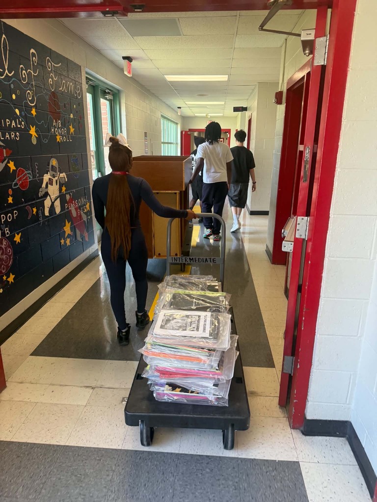Beta Club members helped us move a book room today!