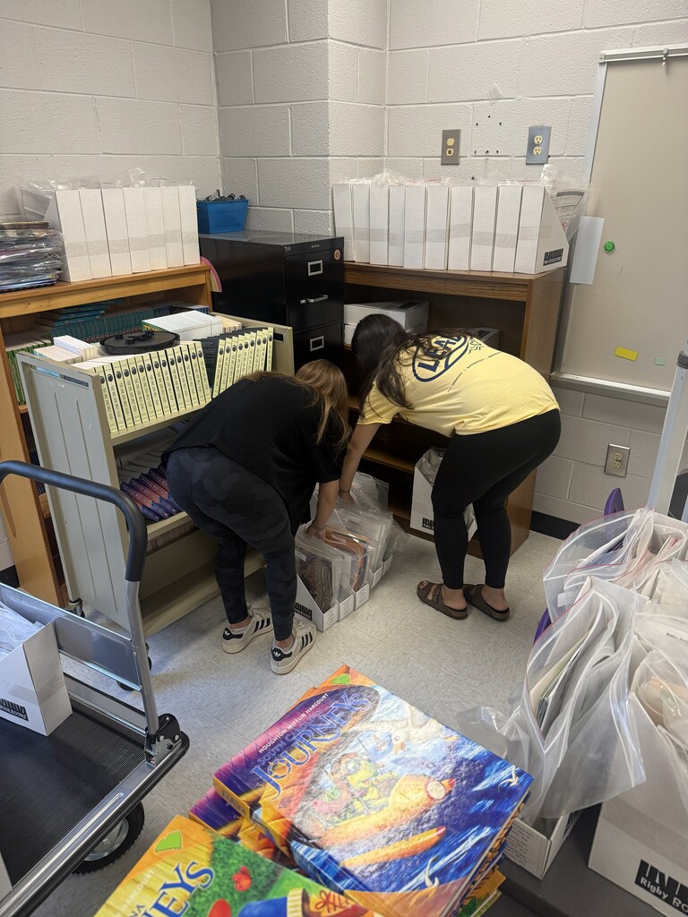 Beta Club members helped us move a book room today!