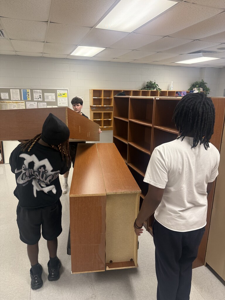 Beta Club members helped us move a book room today!