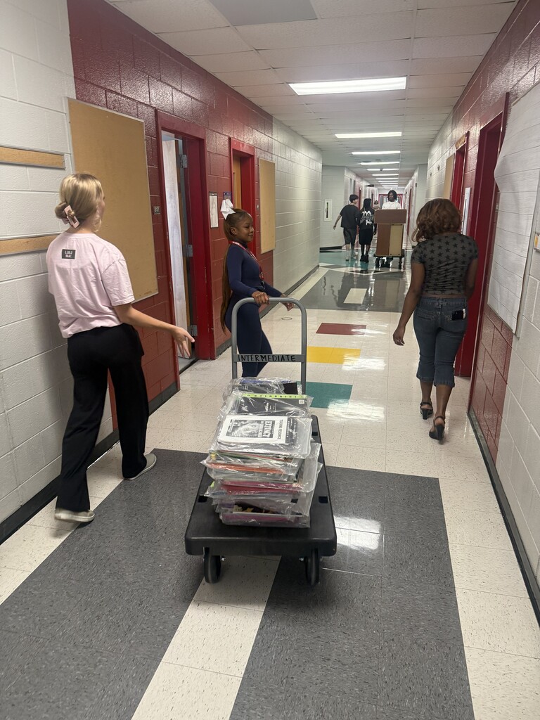 Beta Club members helped us move a book room today!