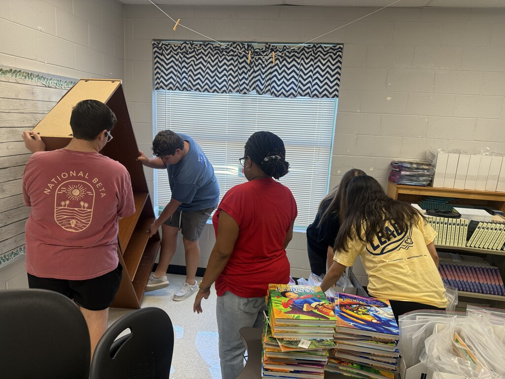 Beta Club members helped us move a book room today!