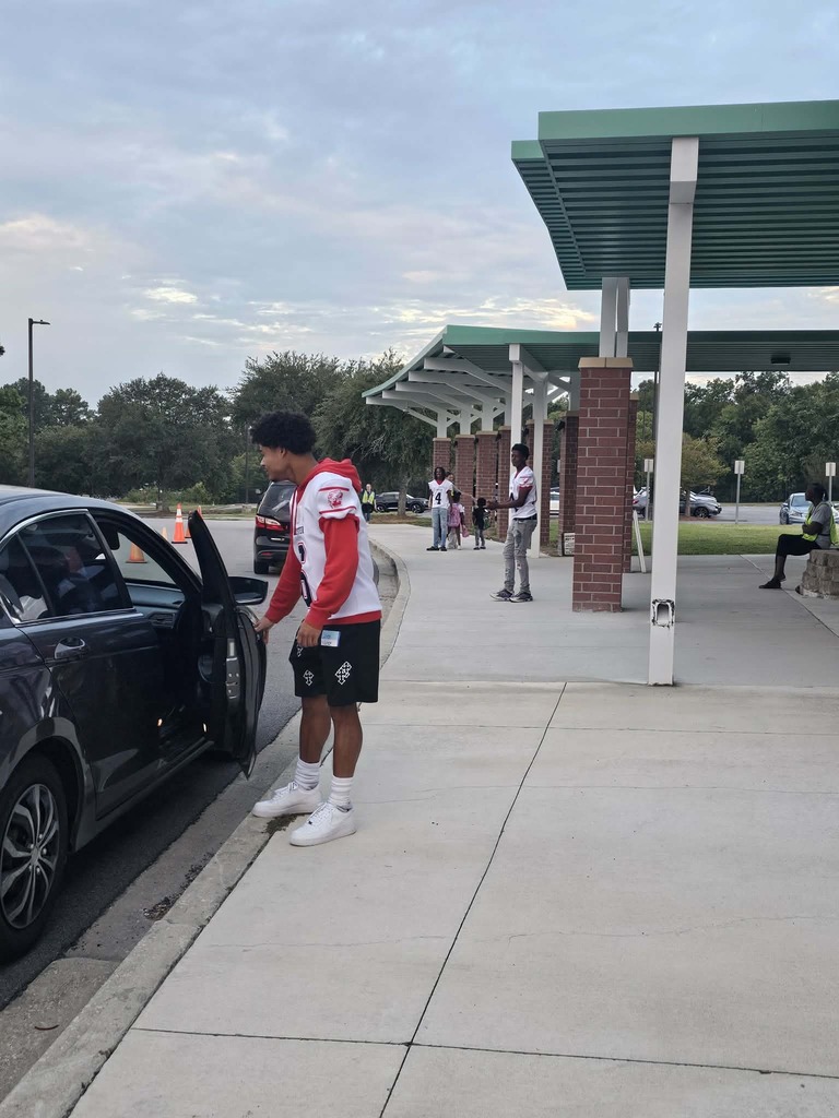 CHS Football players welcomed students to school.