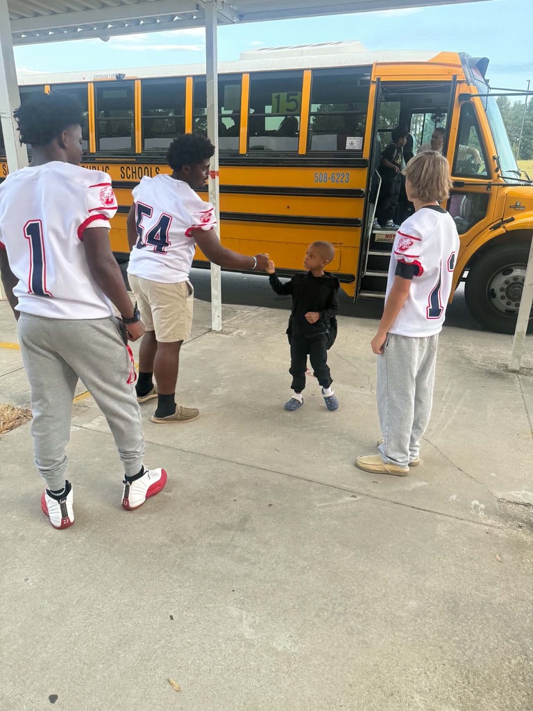 CHS Football players welcomed students to school.