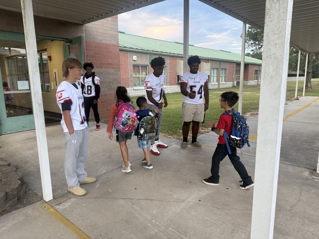 CHS Football players welcomed students to school.