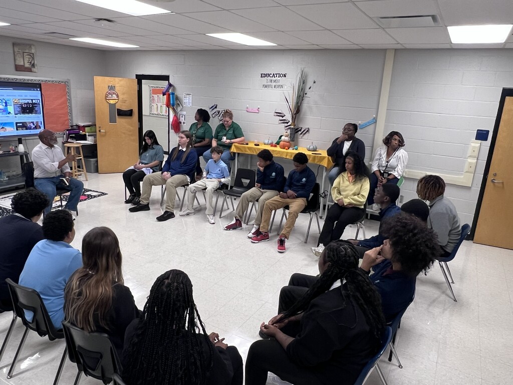 Mr. Travis Commodore interacting with the students of TLC.