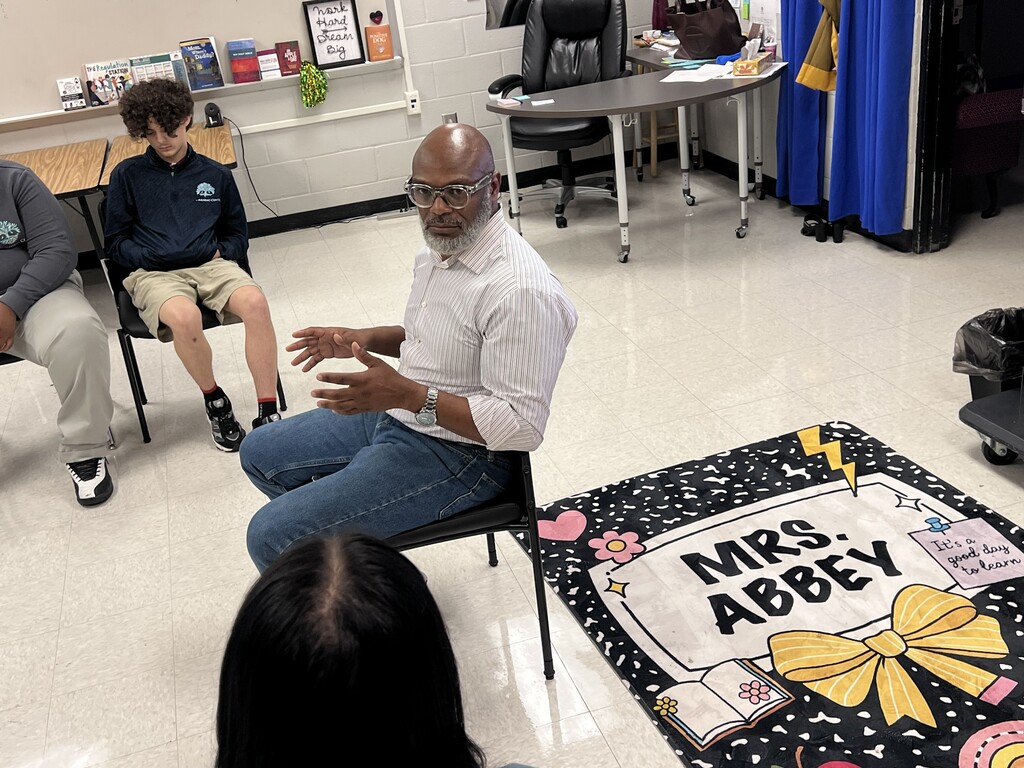 Mr. Travis Commodore interacting with the students of TLC.