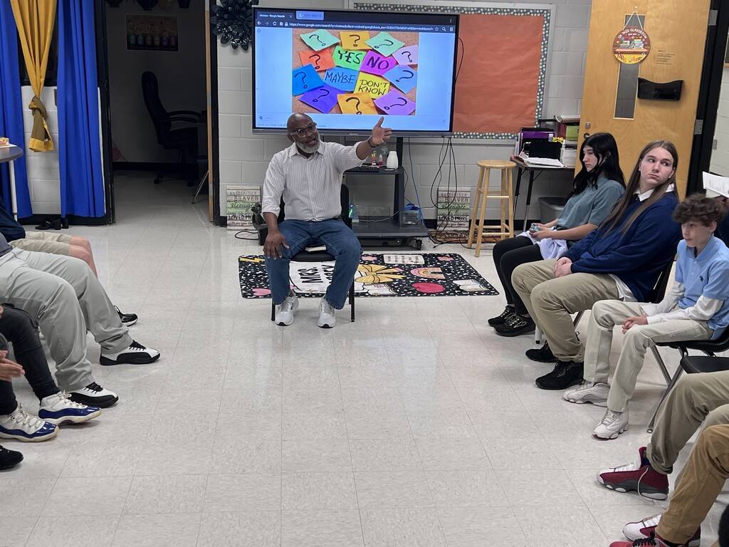 Mr. Travis Commodore interacting with the students of TLC.
