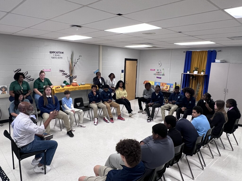 Mr. Travis Commodore interacting with the students of TLC.