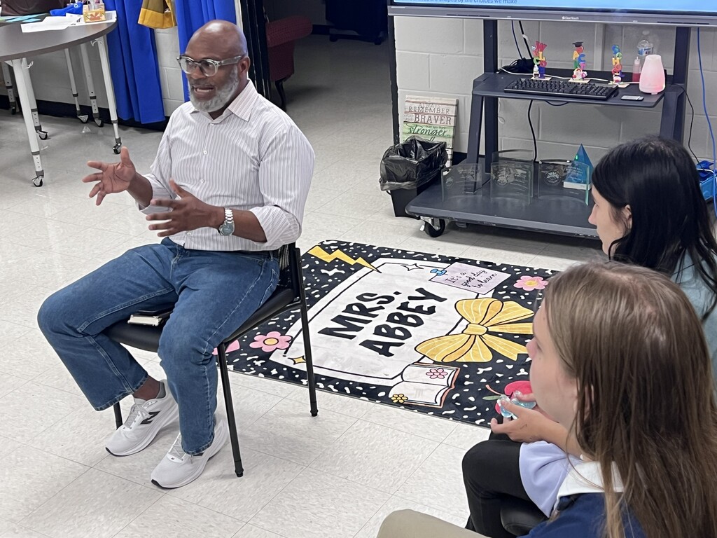 Mr. Travis Commodore interacting with the students of TLC