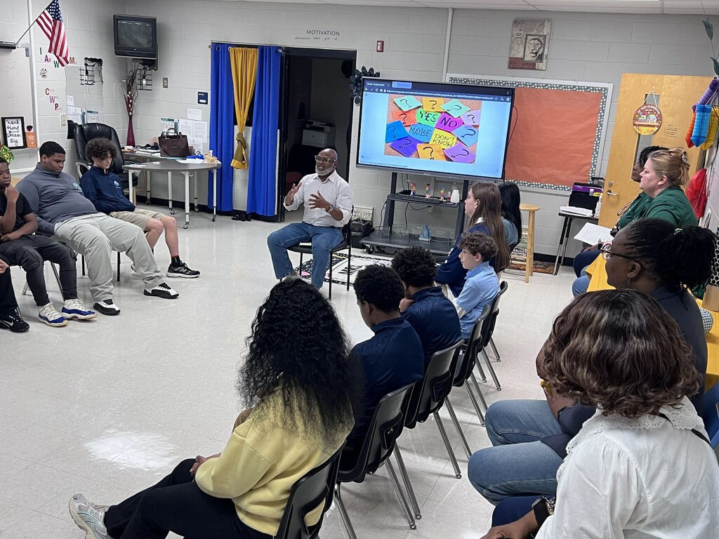 Mr. Travis Commodore interacting with the students of TLC.