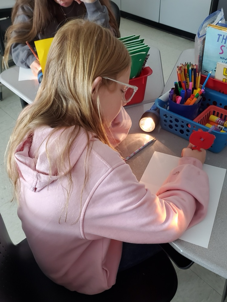 Students used flashlights while working today.