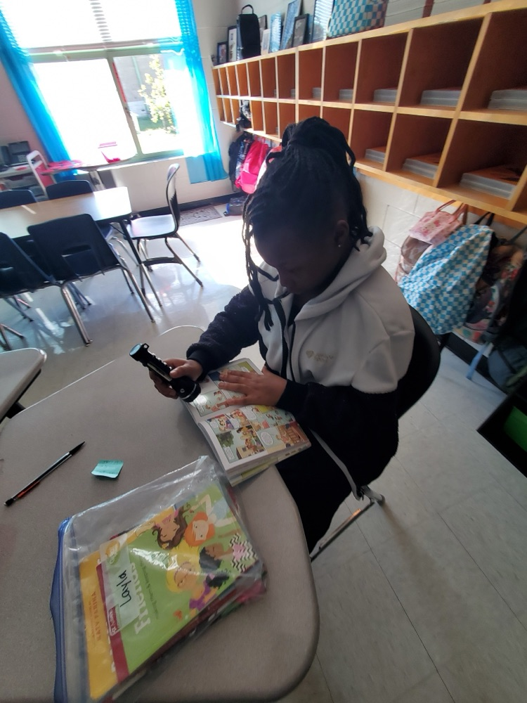 Students used flashlights while working today.