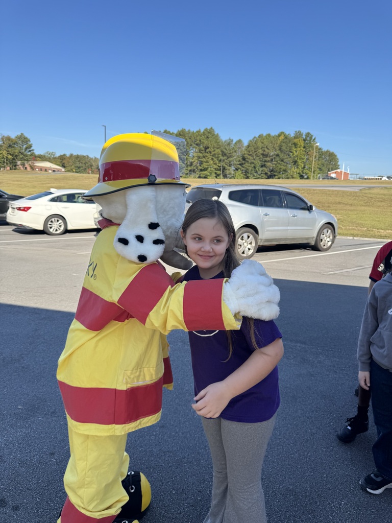 Students enjoy a visit from the fire department.