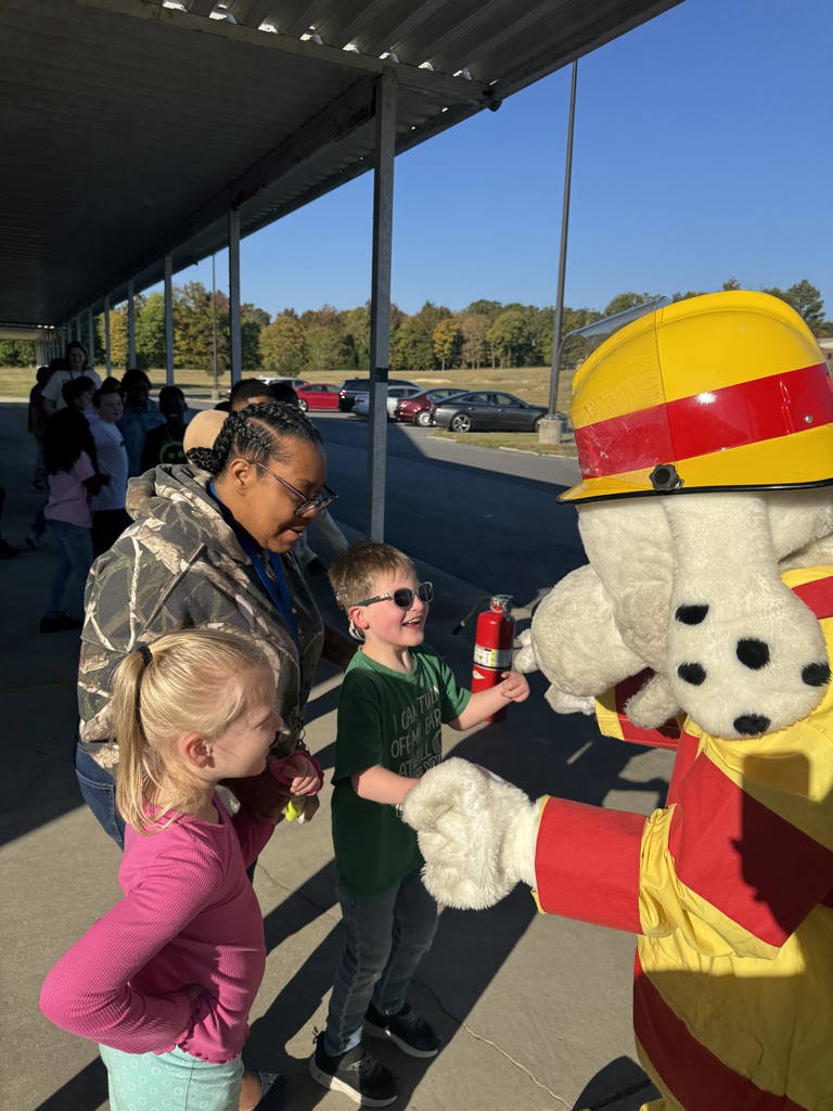 Students enjoy a visit from the fire department.