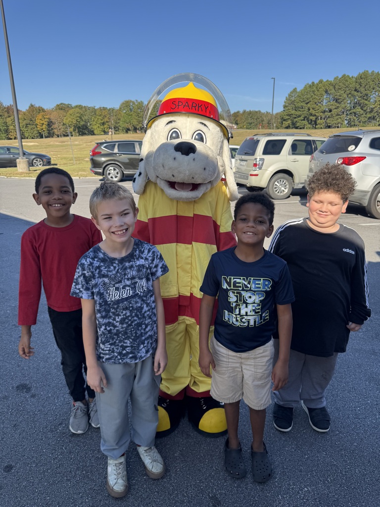 Students enjoy a visit from the fire department.